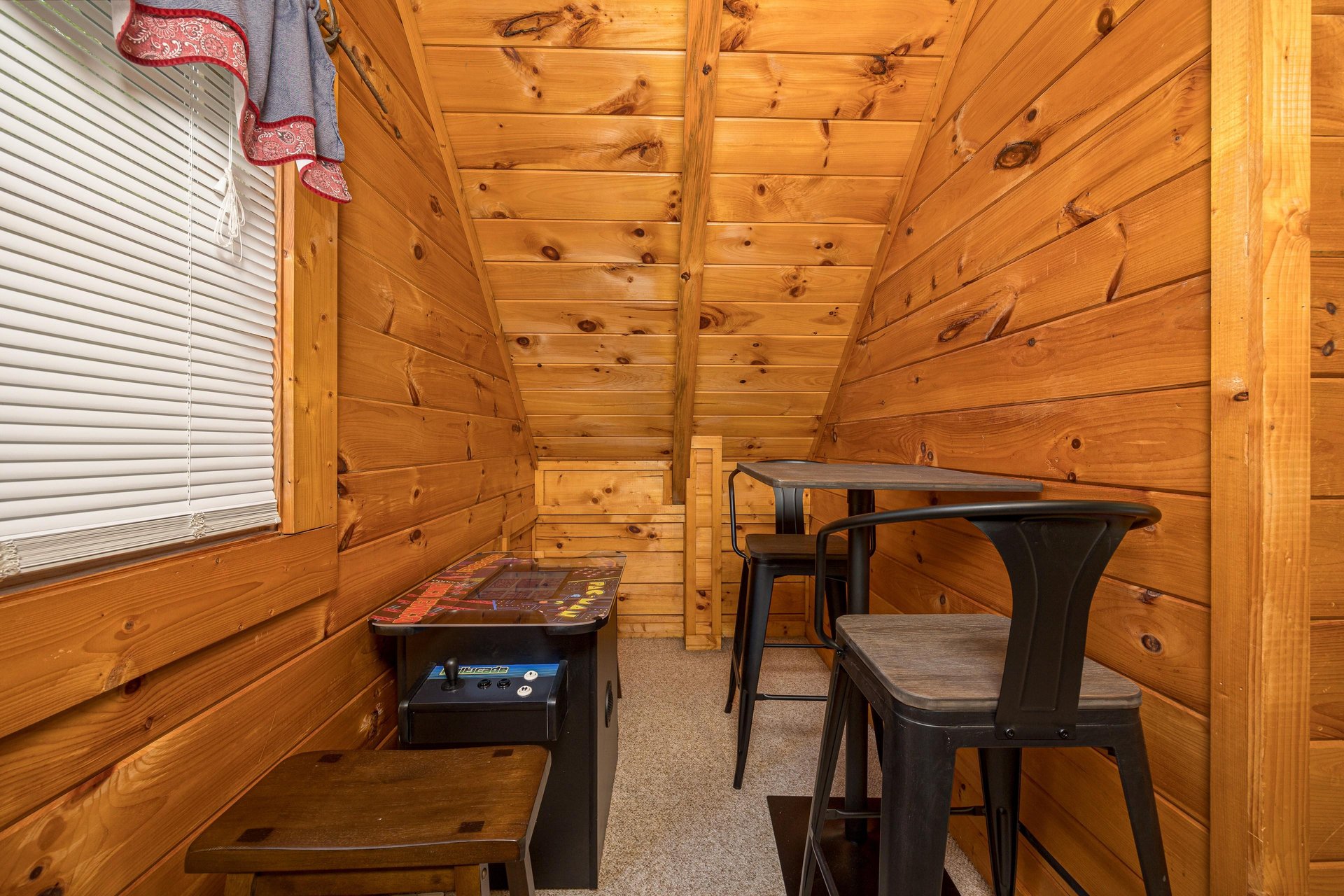 Arcade game with table and chairs