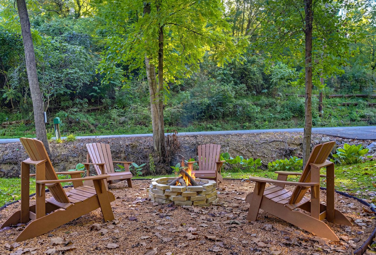 Gather around the fire pit in your private outdoor space, surrounded by peaceful woodland views. Perfect for evening stories under the trees.