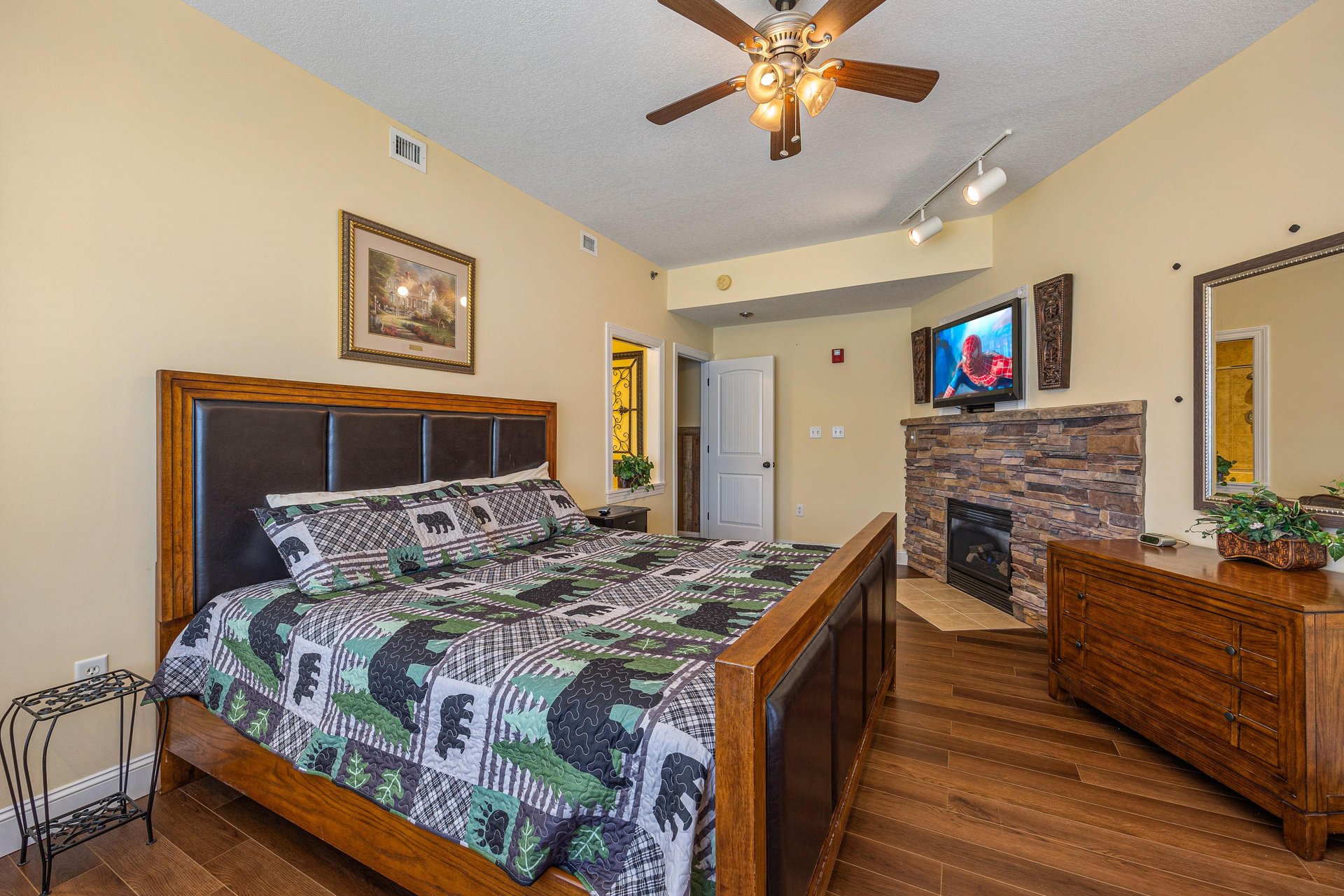 King bed at Heart of Gatlinburg, a 2 bedroom cabin rental located in Gatlinburg