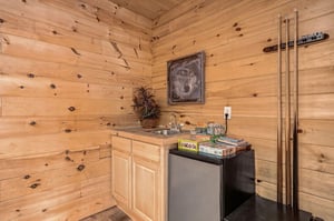 Your cozy log cabin kitchenette offers rustic charm with modern convenience—perfect for preparing light meals between outdoor adventures.
