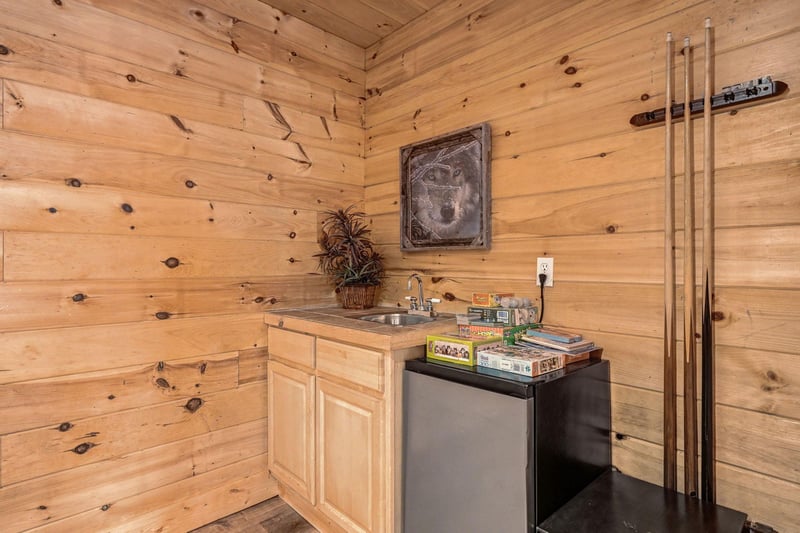 Your cozy log cabin kitchenette offers rustic charm with modern convenience—perfect for preparing light meals between outdoor adventures.