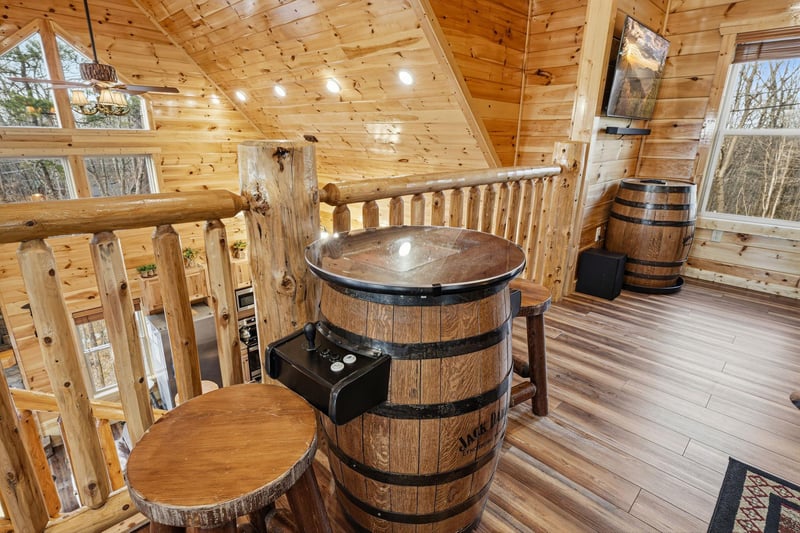 Unwind in your private barrel hot tub, surrounded by warm wood and forest views for the perfect rustic retreat.