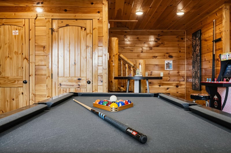 Challenge friends to a game in your private game room, complete with a pool table and arcade for endless entertainment during your mountain getaway.