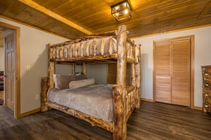 Lower level log bunk bed