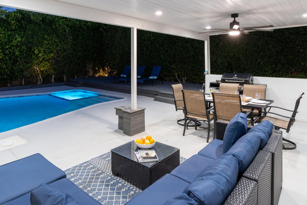 Gather around the outdoor sofa for a chat and a glass of wine