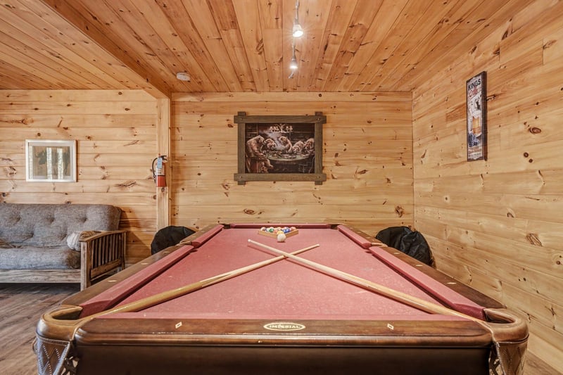 Challenge friends to pool in your private game room, surrounded by warm wood and rustic charm.