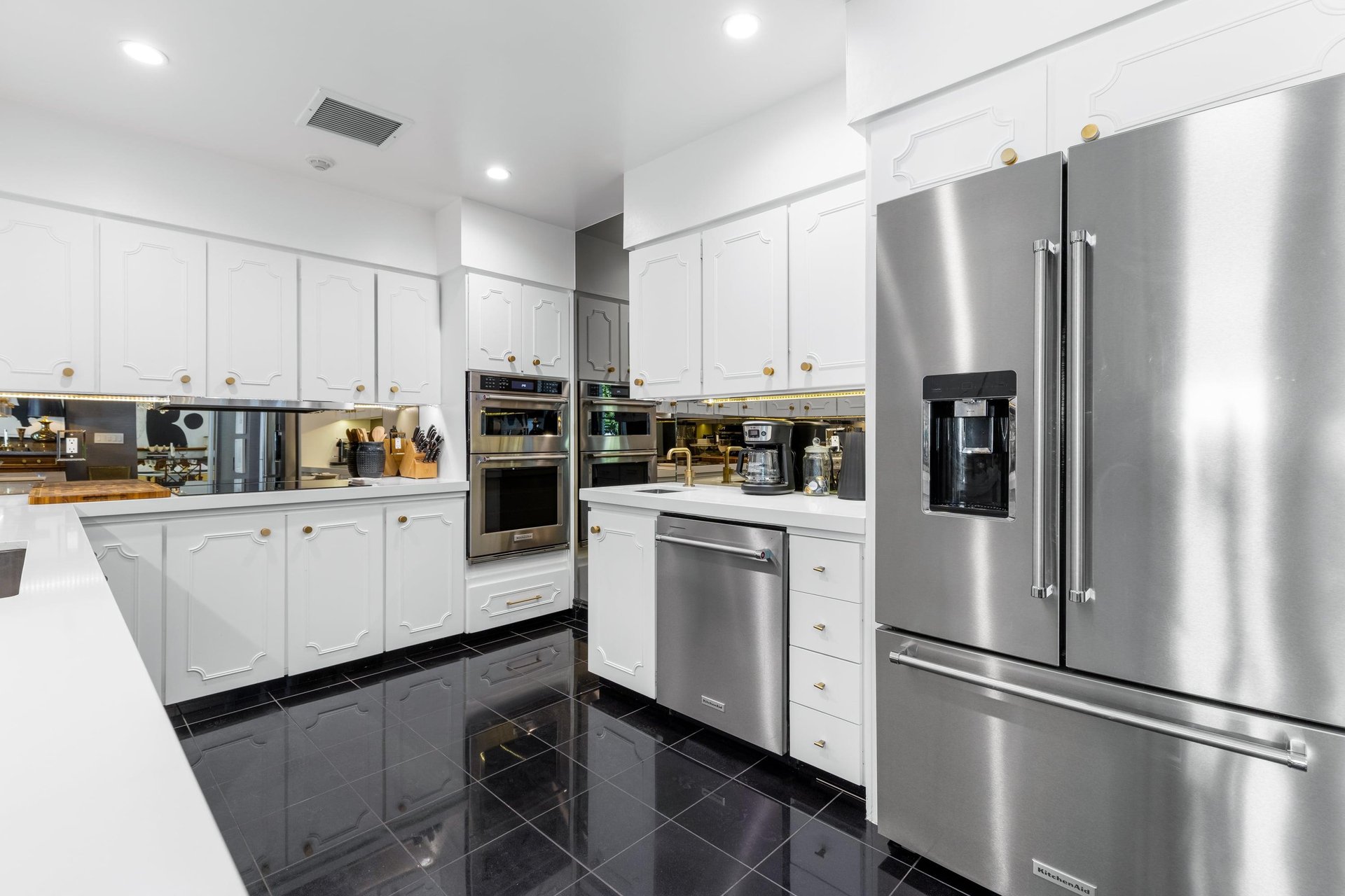 Dramatic black  white Chefs kitchen