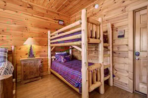 Log Bunk Beds at Mountain Mama, a 3 bedroom cabin rental located in pigeon forge