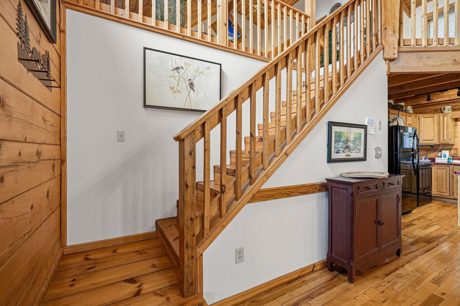 Warm wood details and handcrafted touches create a cozy mountain retreat atmosphere throughout your vacation home.