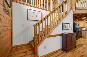 Warm wood details and handcrafted touches create a cozy mountain retreat atmosphere throughout your vacation home.