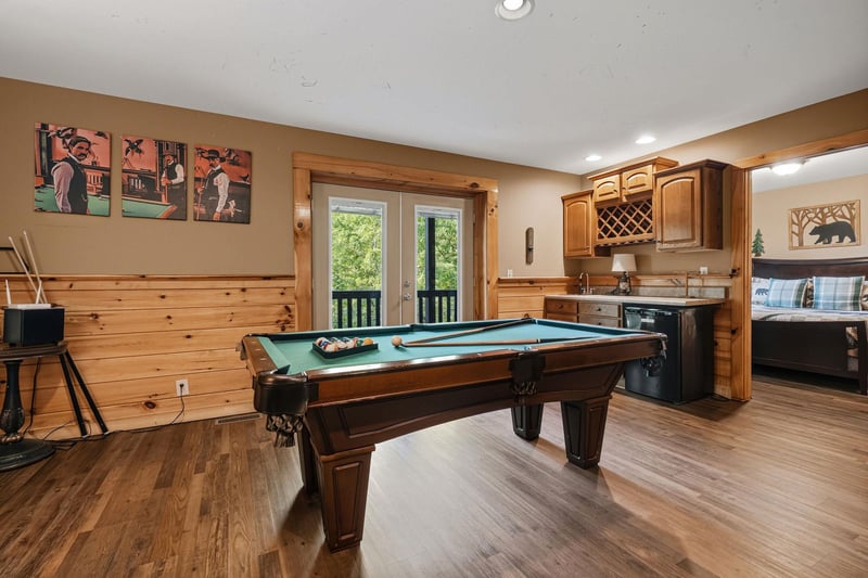 Challenge friends to pool while dinner simmers in your spacious game room, where rustic charm meets modern comfort.