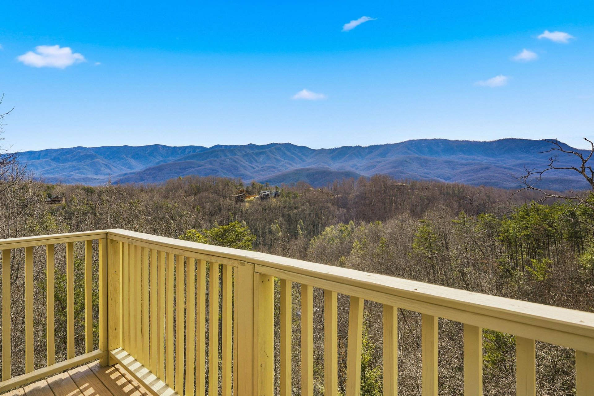 Breathtaking mountain panorama stretches endlessly before this elevated balcony perch in the scenic foothills.