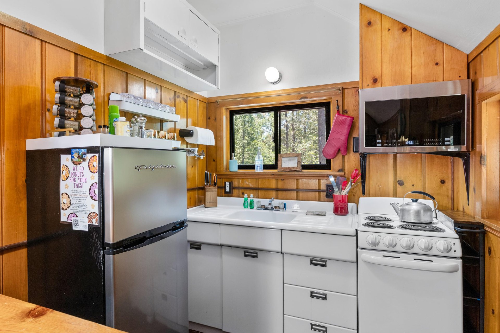 Full size kitchen located next to the sleeping area.