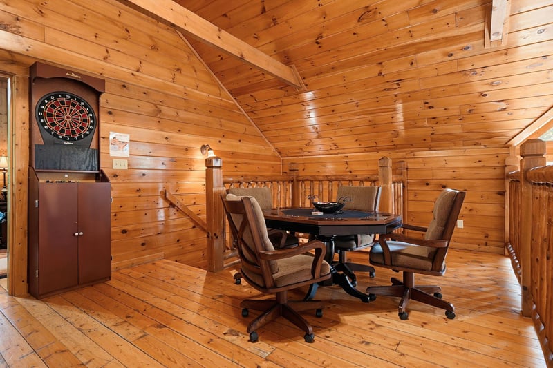 Challenge friends to a friendly game at the round table or test your aim at the dartboard in this warm loft space with soaring wood ceilings and rustic charm.