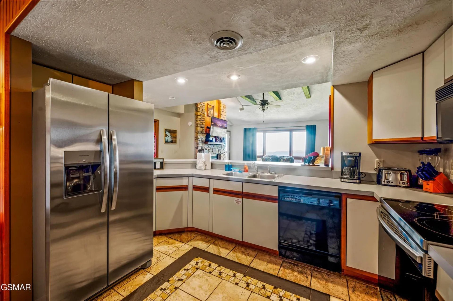 Your fullyequipped kitchen awaits with stainless steel appliances, granite countertops, and everything needed to prepare delicious meals during your stay.