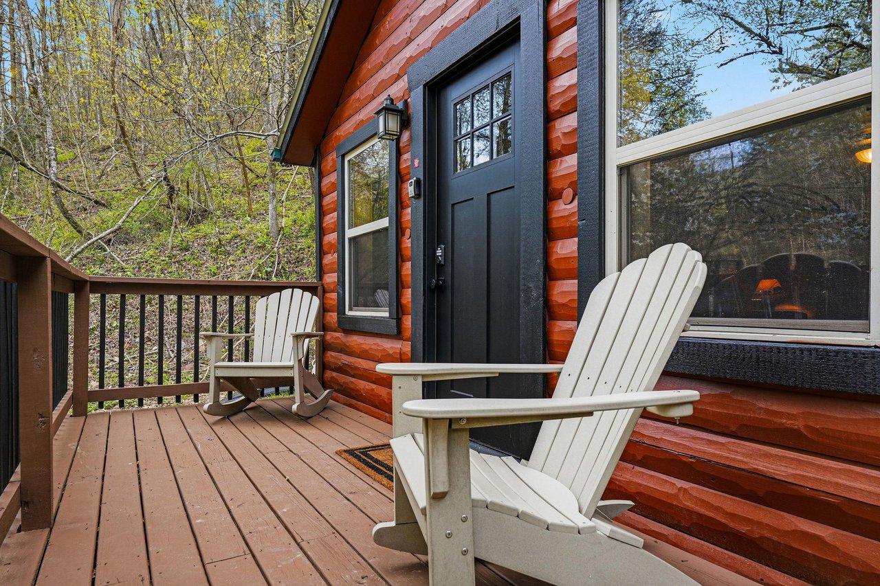 Settle into these cozy Adirondack chairs on your private deck, where morning coffee tastes better surrounded by natures peaceful embrace.
