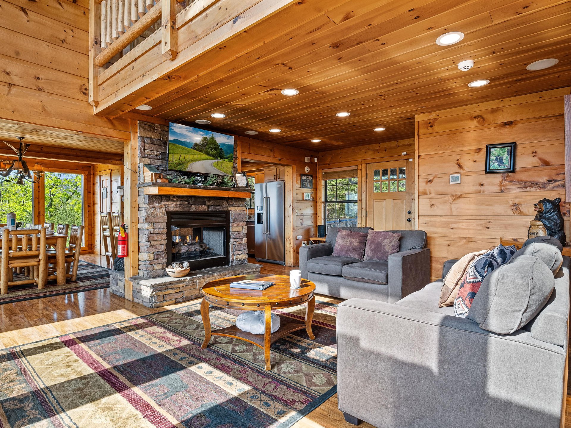 Living room with stone fireplace