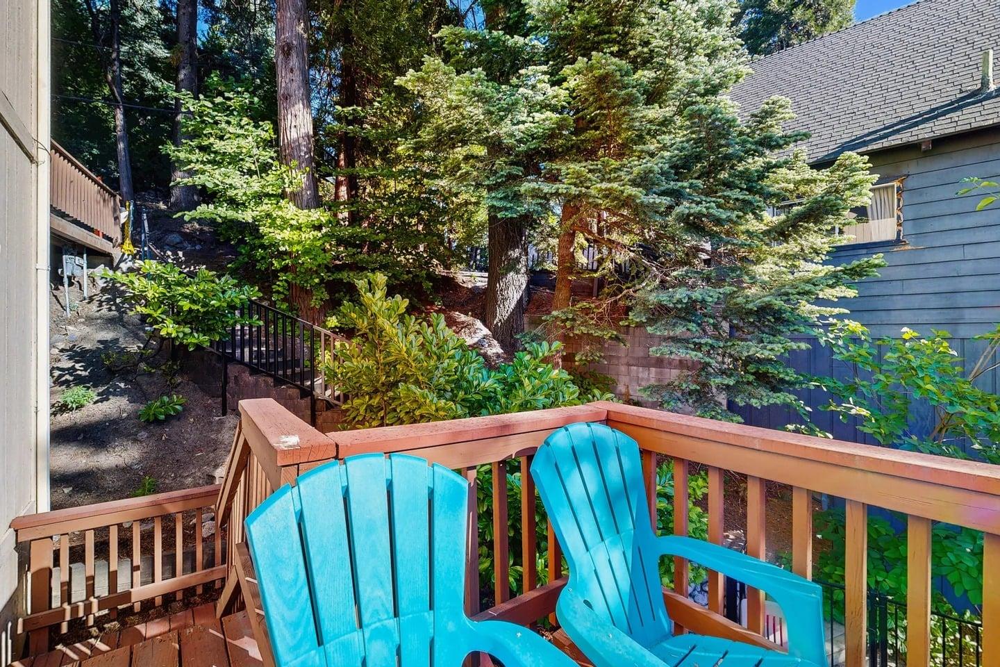 Beautiful, expansive deck with mountain  treetop views, outdoor dining, and BBQ.