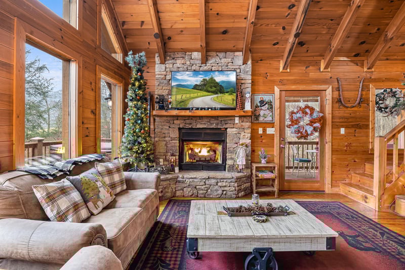 Living room with stone fireplace