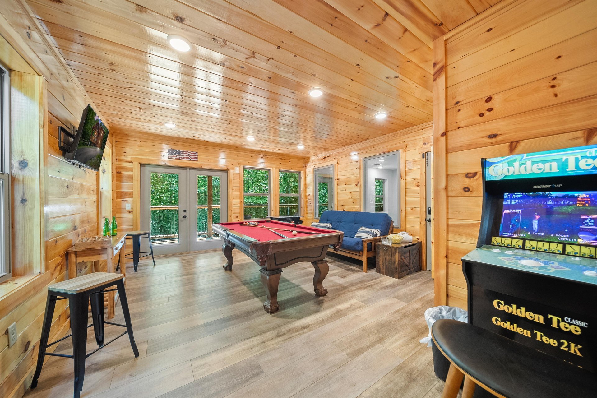 pool table, futon and arcade