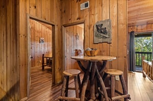 Wooden table with stools