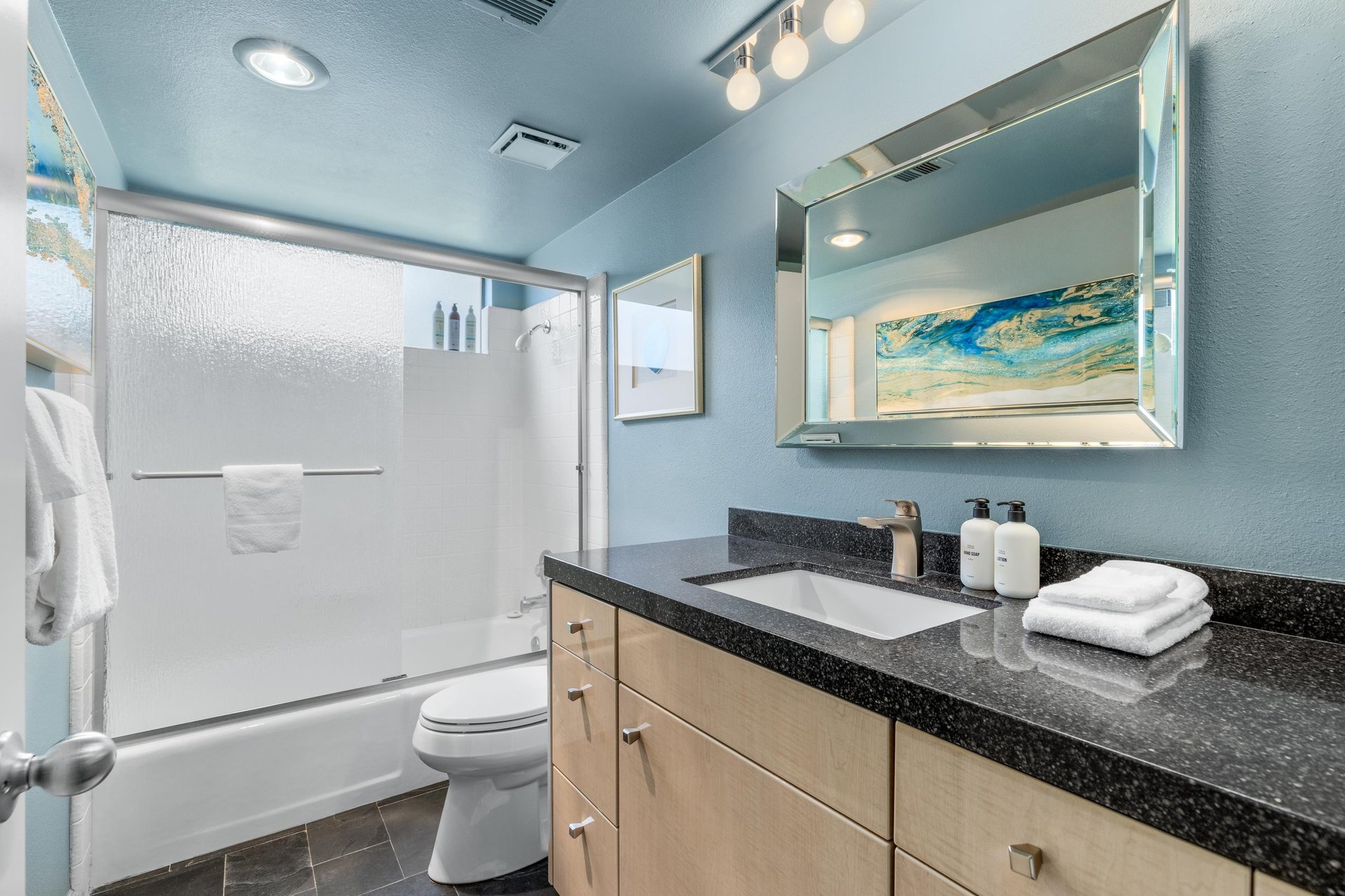 Modern fixtures and showertub combination.