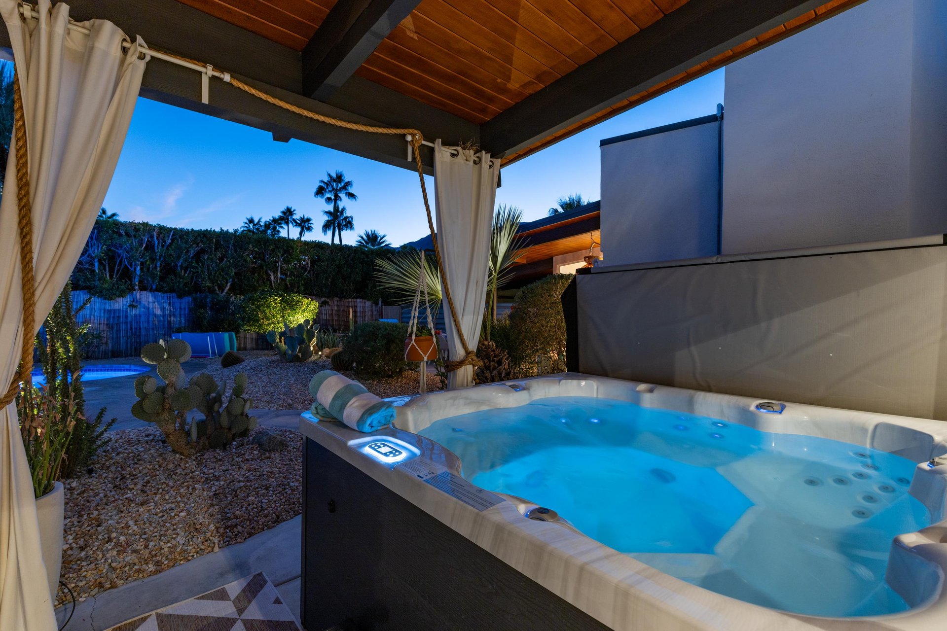 Soak in your private hot tub under the desert sky, where warm bubbles and twinkling lights create pure magic.