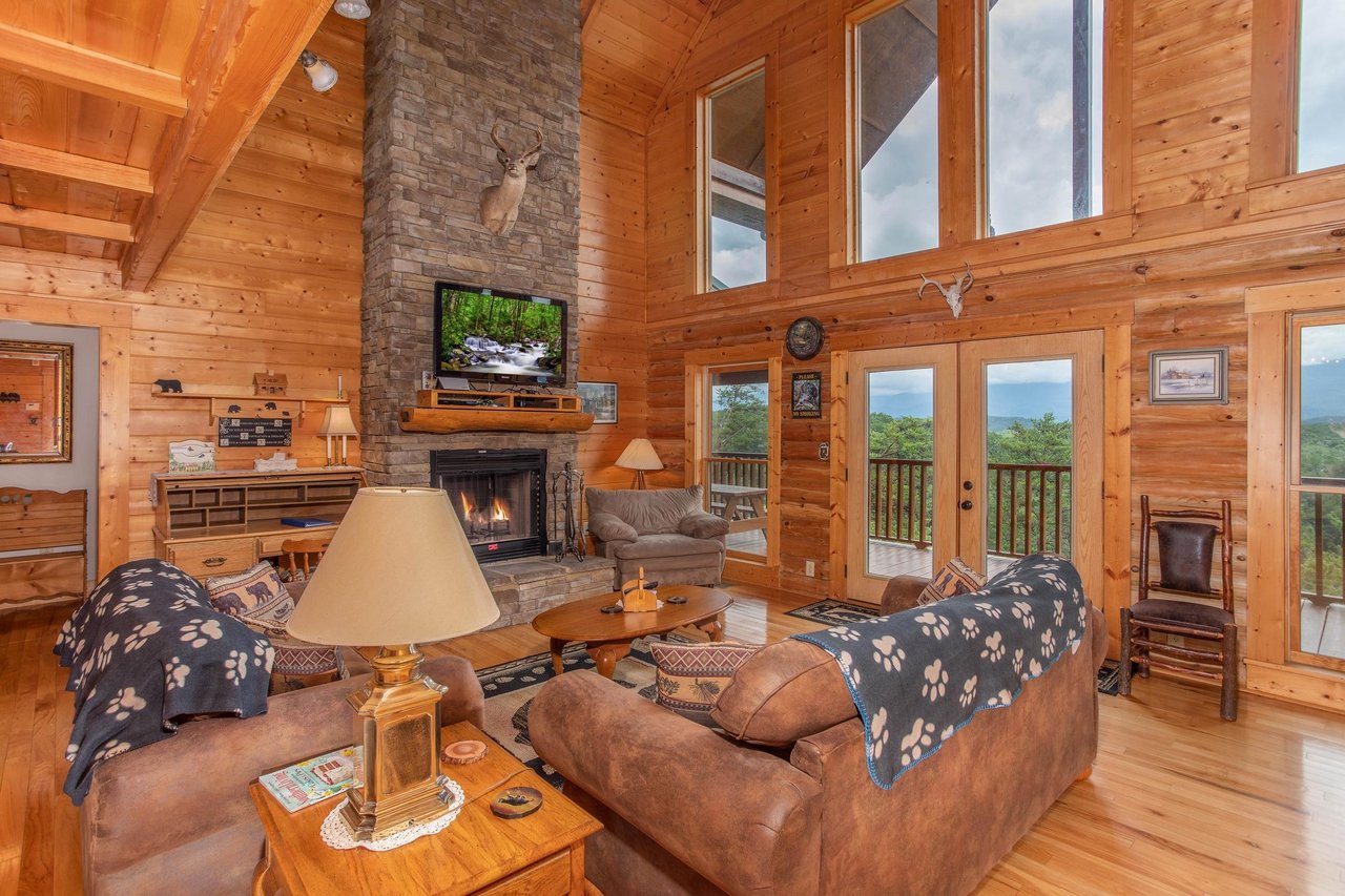 Living room with stone fireplace