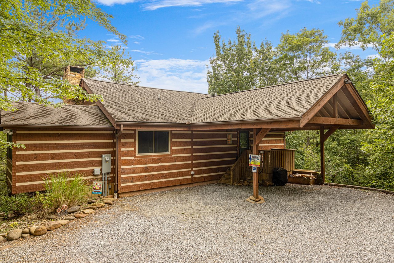 Parking area and front of the cabin at Cubs Crib, a 3 bedroom cabin rental located in Gatlinburg