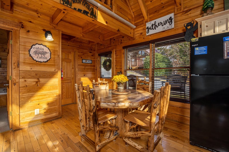 Dining table for 4 at Bear Feet Retreat, a 1 bedroom cabin rental located in pigeon forge