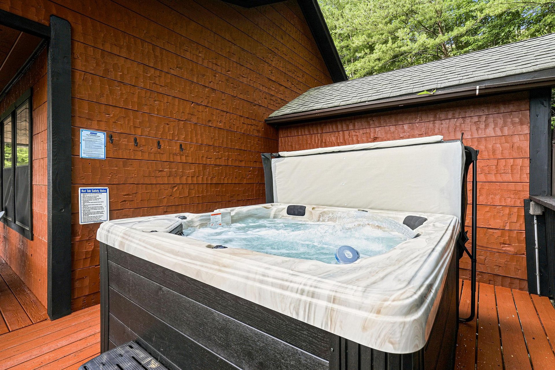 Slip into warm, bubbling water on your private deck, surrounded by lush greenery and the peaceful quiet of nature.