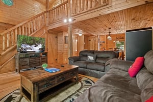 open concept with above loft and game room