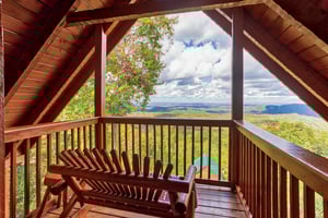 Top deck with bench and view at EllaVation, a 3 bedroom cabin rental located in Gatlinburg
