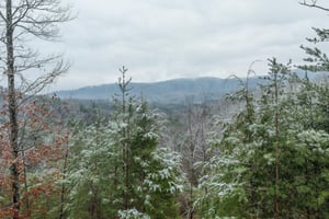 Snowy mountain views at Alpine Romance, a 2 bedroom cabin rental located in Pigeon Forge