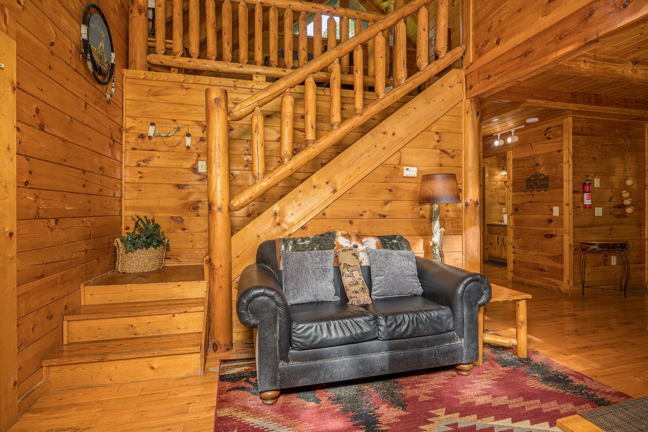 Loveseat by staircase