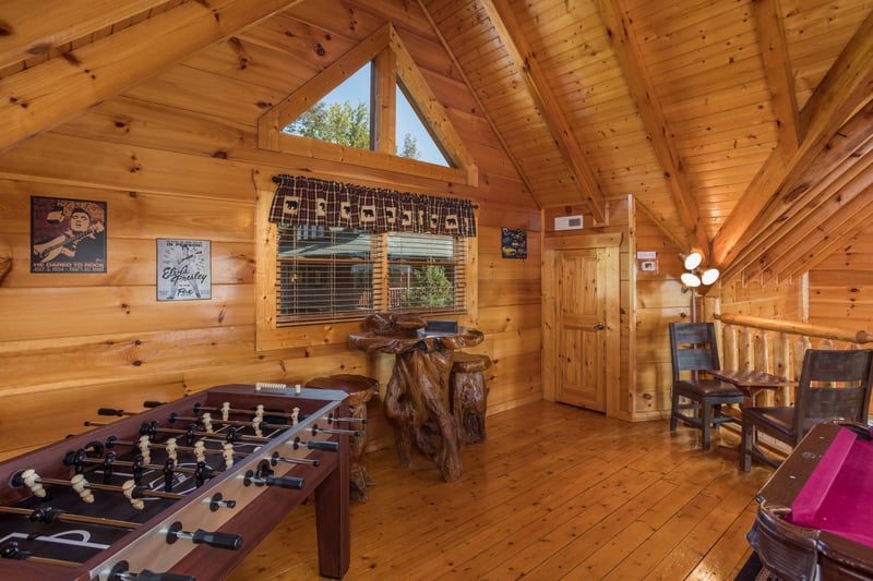 Foosball table in the game loft at Graceland, a 4bedroom cabin rental located in Pigeon Forge