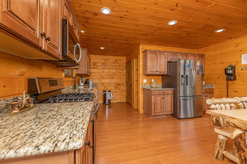 Kitchen with stainless appliances and granite counters