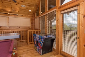 Multicade game at Howlin in the Smokies, a 2 bedroom cabin rental located in Pigeon Forge