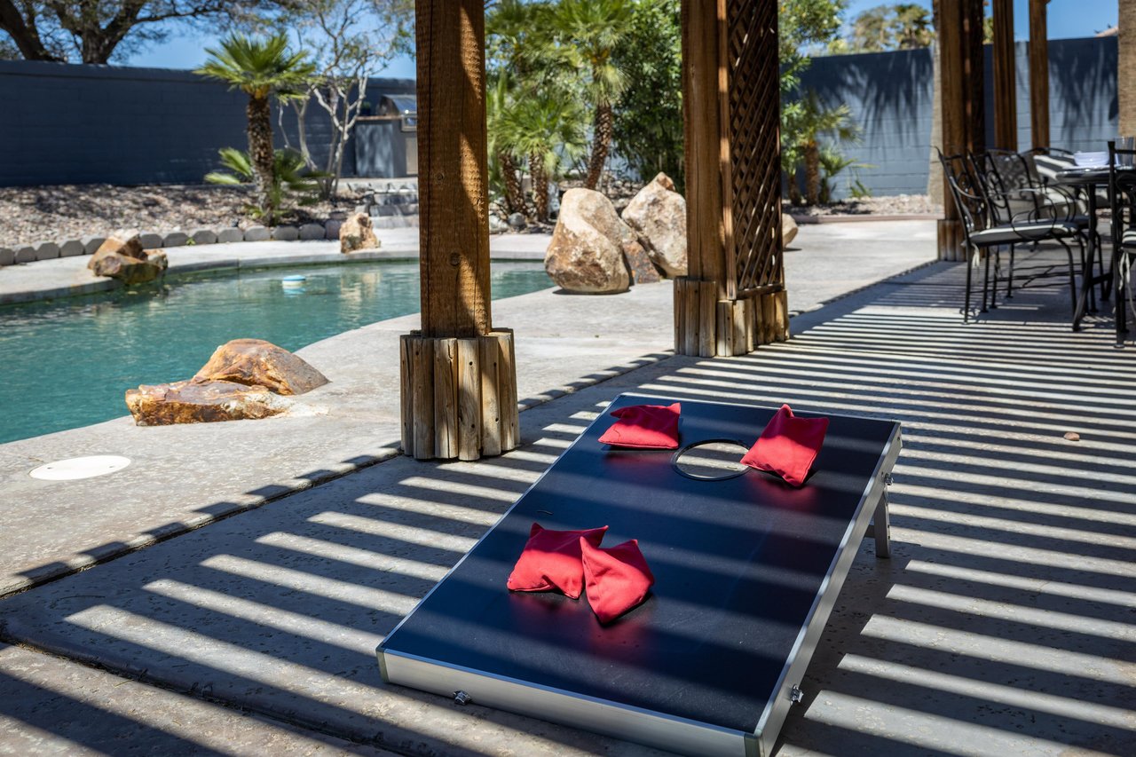 Play a game of cornhole