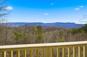 Relax on your private balcony with sweeping mountain views stretching across the horizon.