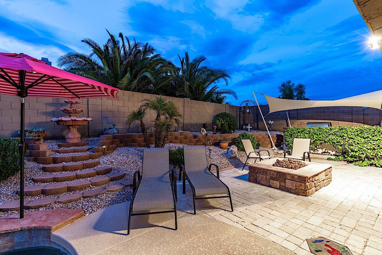 Chaise lounges and a fire pit