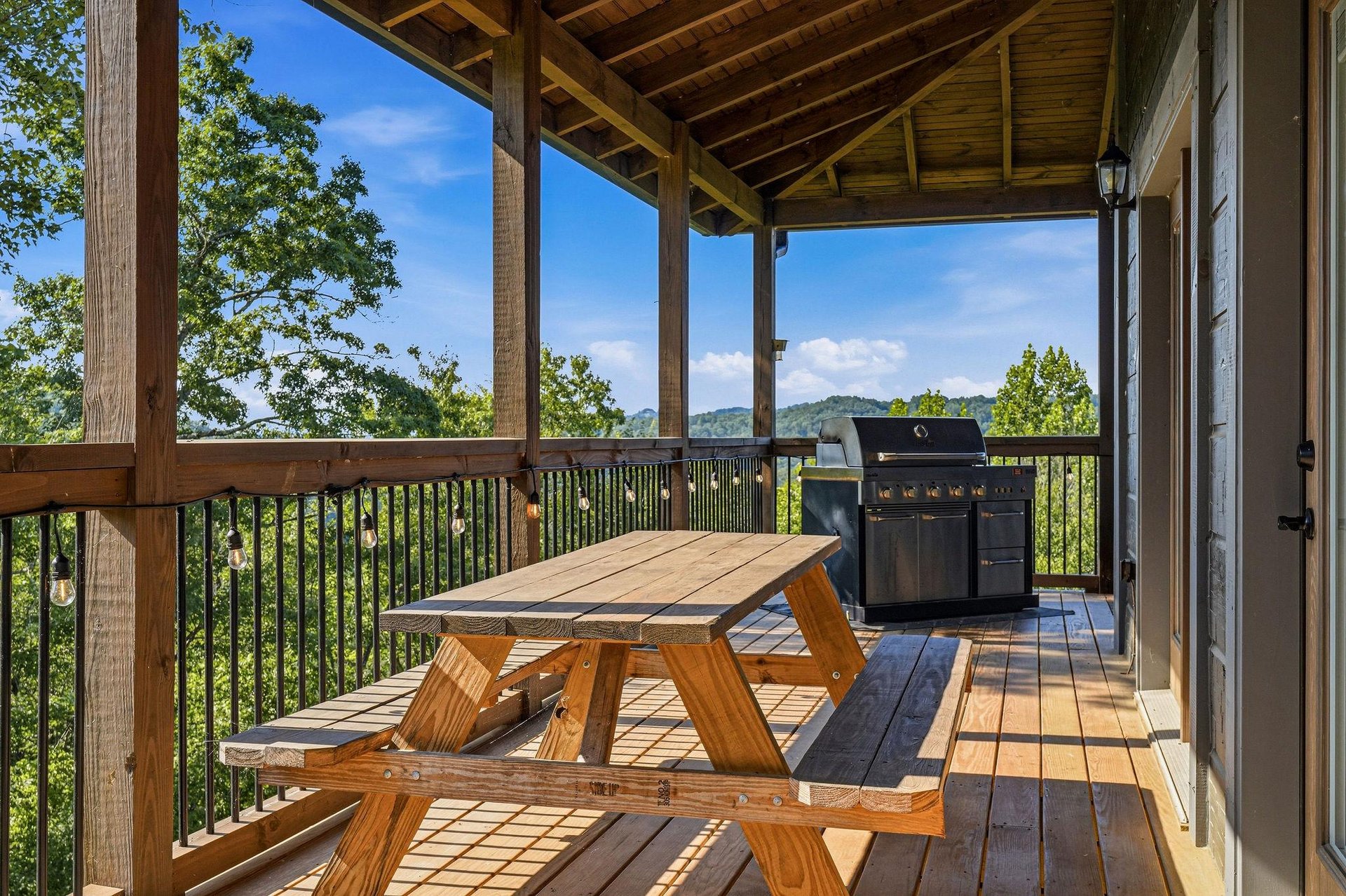 Fire up the grill and savor mountain views from your covered deck, complete with a picnic table perfect for alfresco dining in the fresh air.