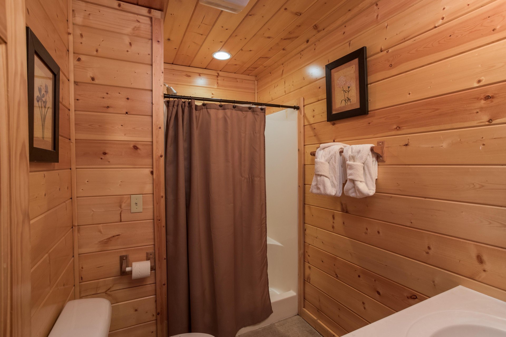 Bathroom with a shower at Kick Back  Relax A 4 bedroom cabin rental located in Pigeon Forge