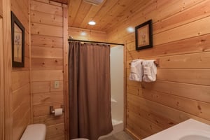 Bathroom with a shower at Kick Back  Relax A 4 bedroom cabin rental located in Pigeon Forge