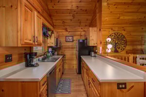 Galley kitchen at Kellys Cabin, a 1 bedroom cabin rental located in Pigeon Forge