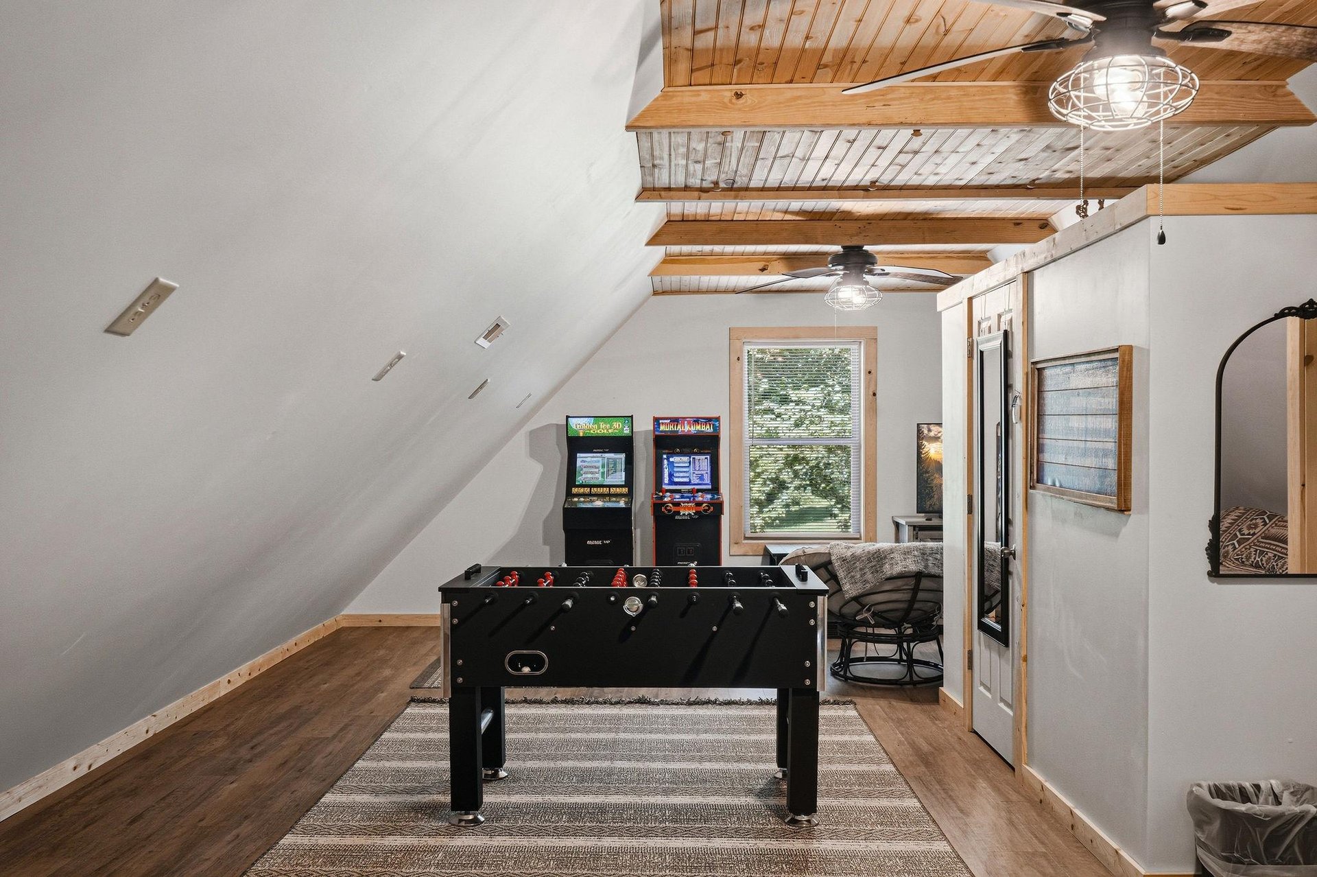 Challenge friends to foosball, arcade games, and more in your private game room beneath stunning woodbeam ceilings. Game nights just got unforgettable.