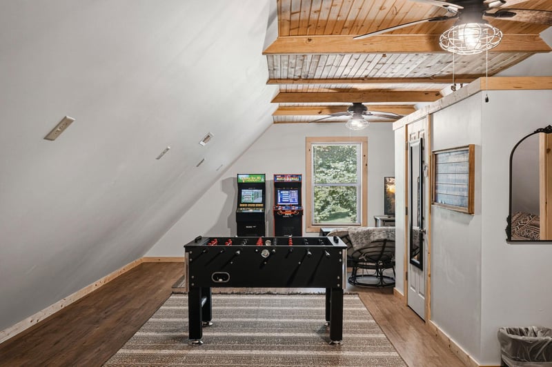 Challenge friends to foosball, arcade games, and more in your private game room beneath stunning woodbeam ceilings. Game nights just got unforgettable.