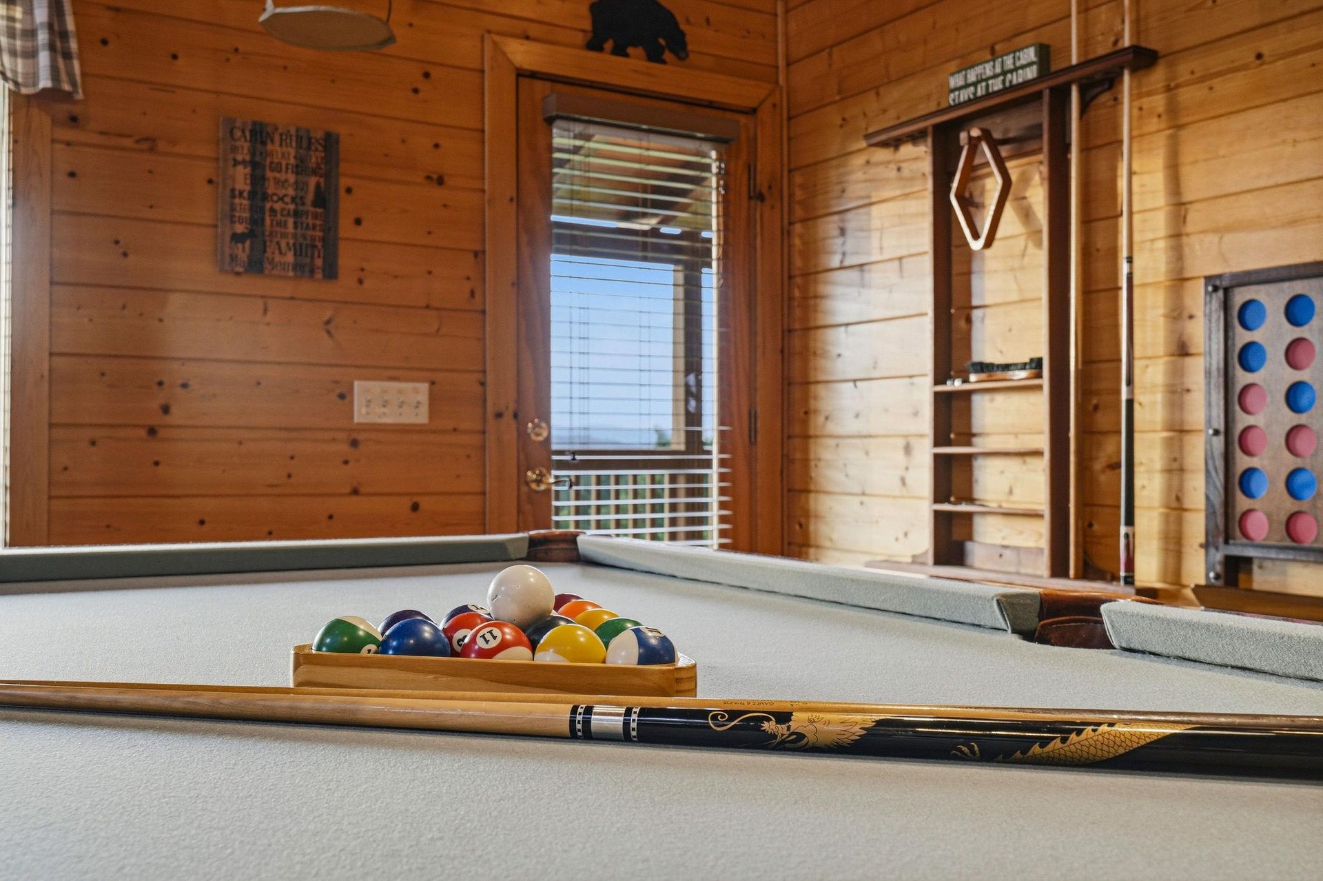 Challenge your group to a friendly game of pool in this warm, woodpaneled retreat complete with rustic charm and mountain lodge appeal.
