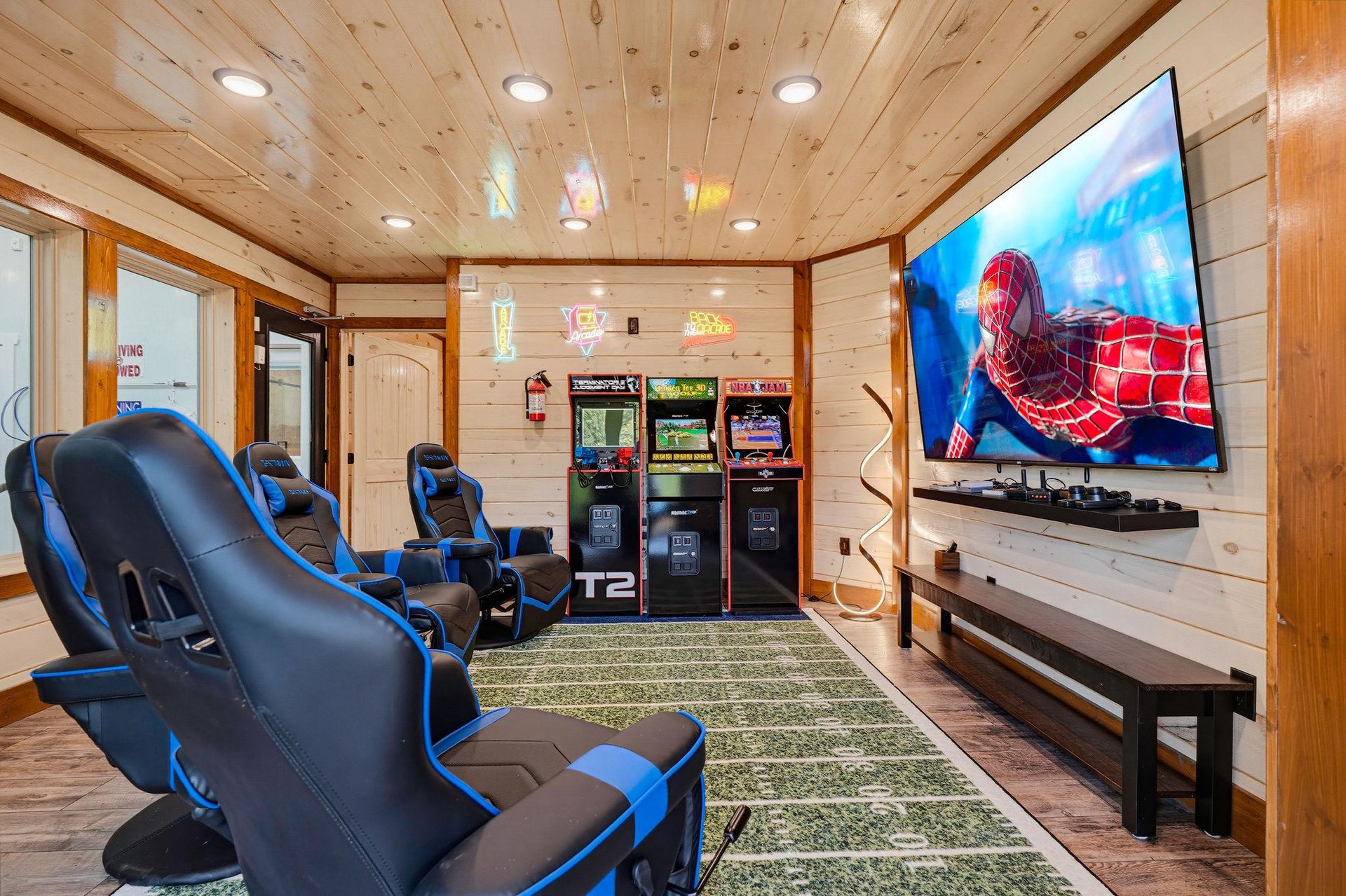 Your private game room awaits, complete with arcade classics and a bigscreen setup for movie nights or epic gaming sessions.