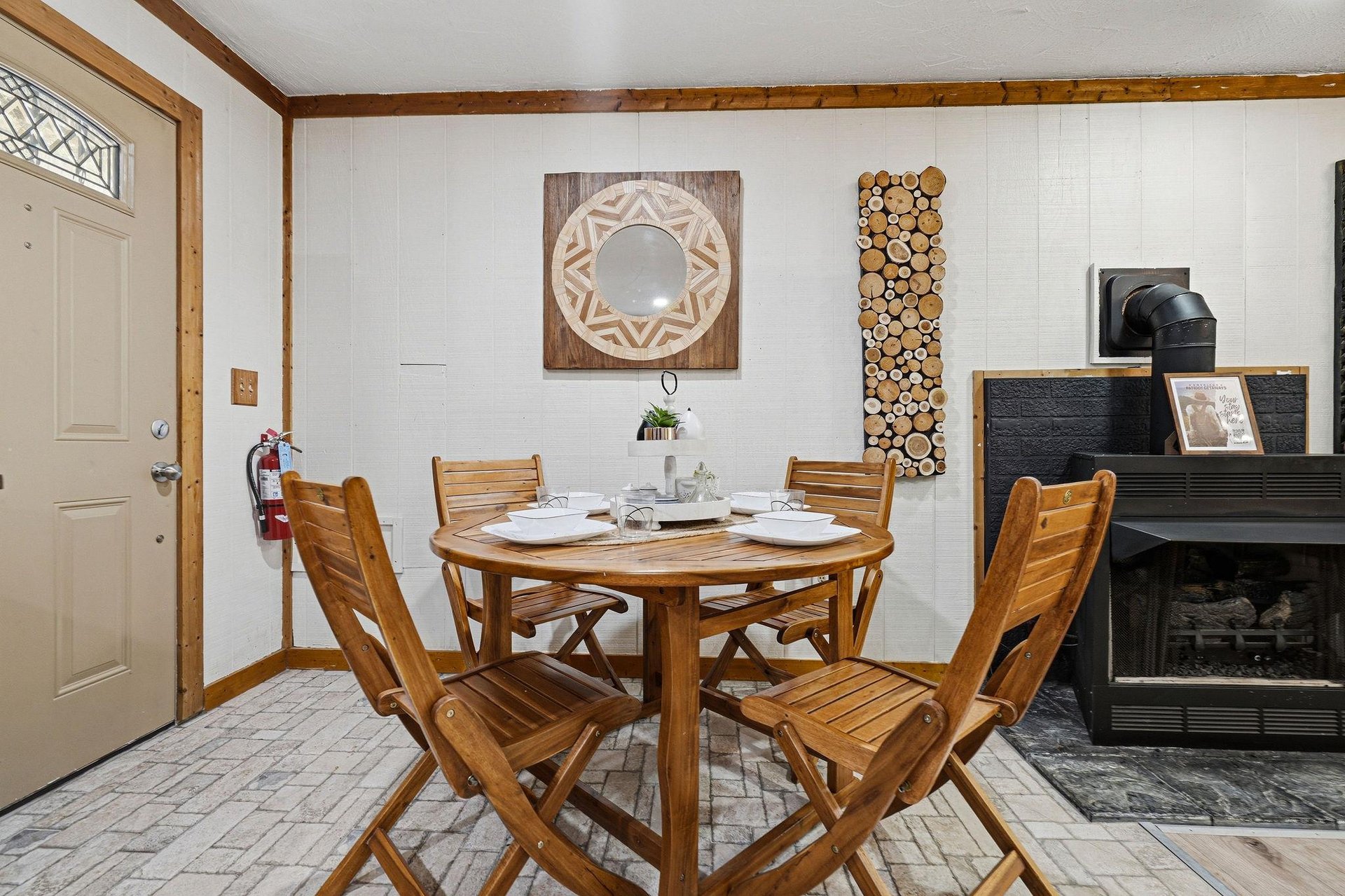 Gather around your cozy dining table beside the warmth of a rustic fireplace, where memorable meals await.